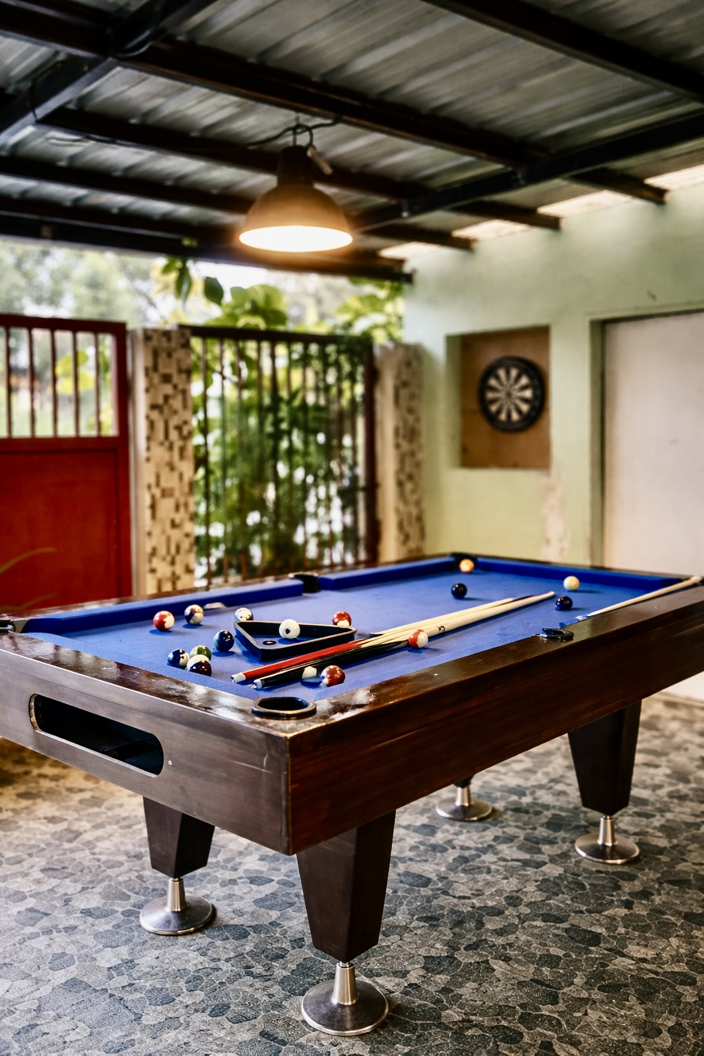 Pool table and darts board